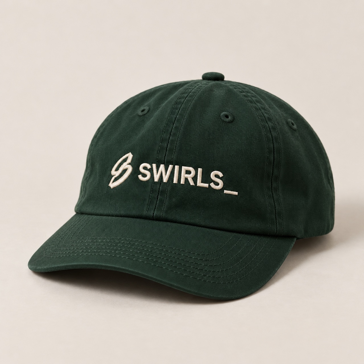 Soft six-panel forest green Swirls cap concept with a curved brim and cream embroidered icon and wordmark
